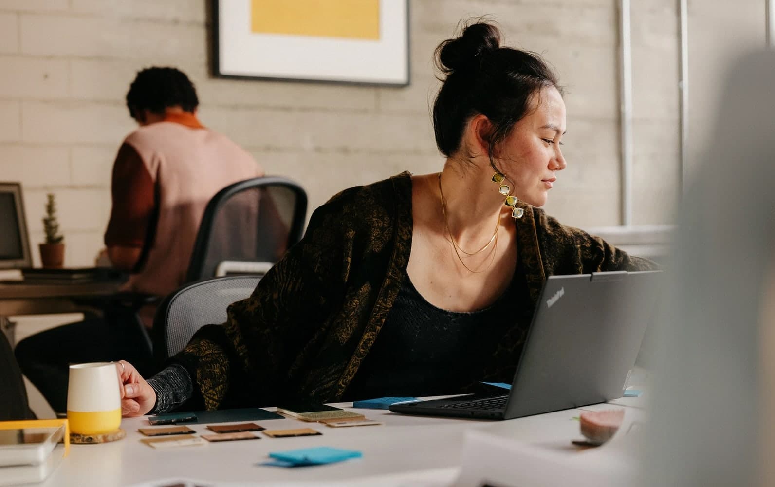 A woman working at her laptop